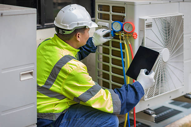 Professional Heat Pump Repair technician working in Twelve Mile, IN